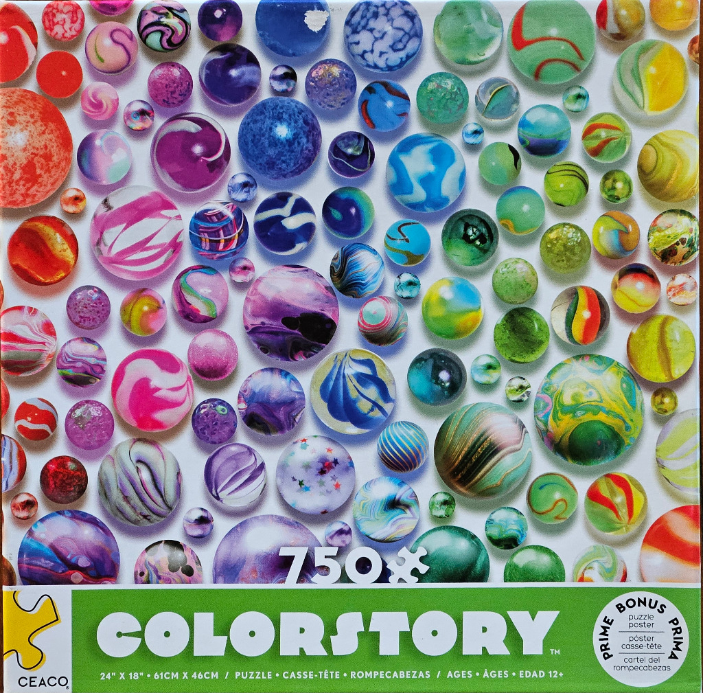 A collection of assorted glass marbles of varying sizes and swirling colors arranged against a white background.