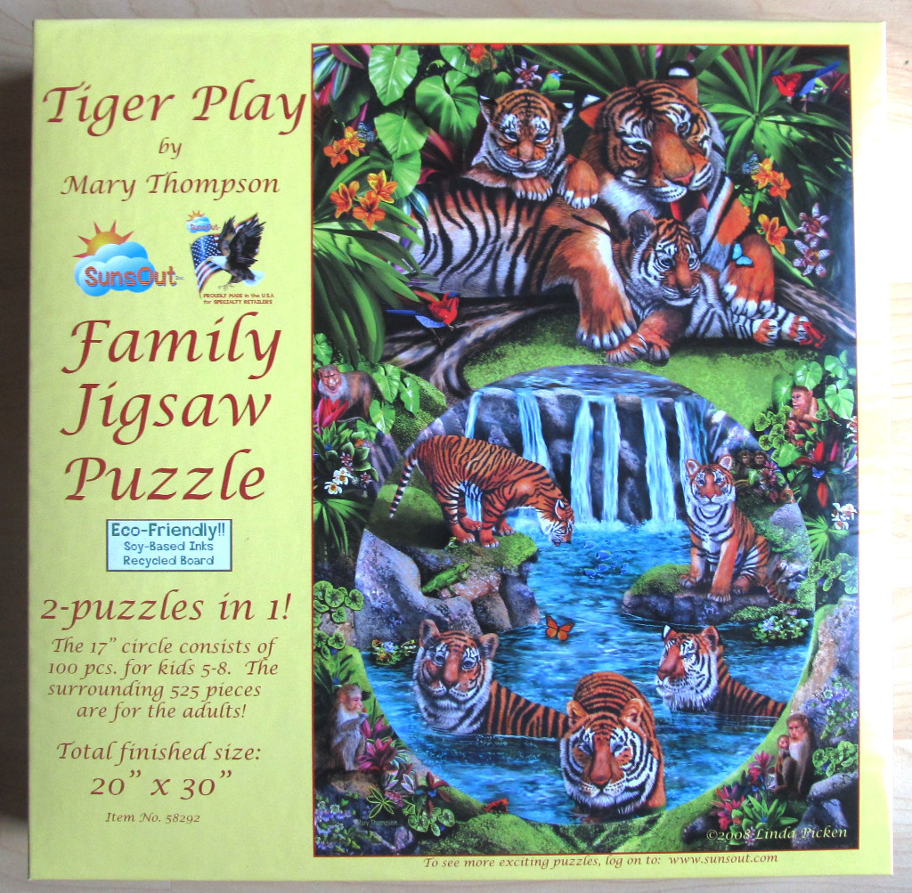 A detailed illustration of a tiger family in a jungle setting surrounding a central circular waterfall scene.