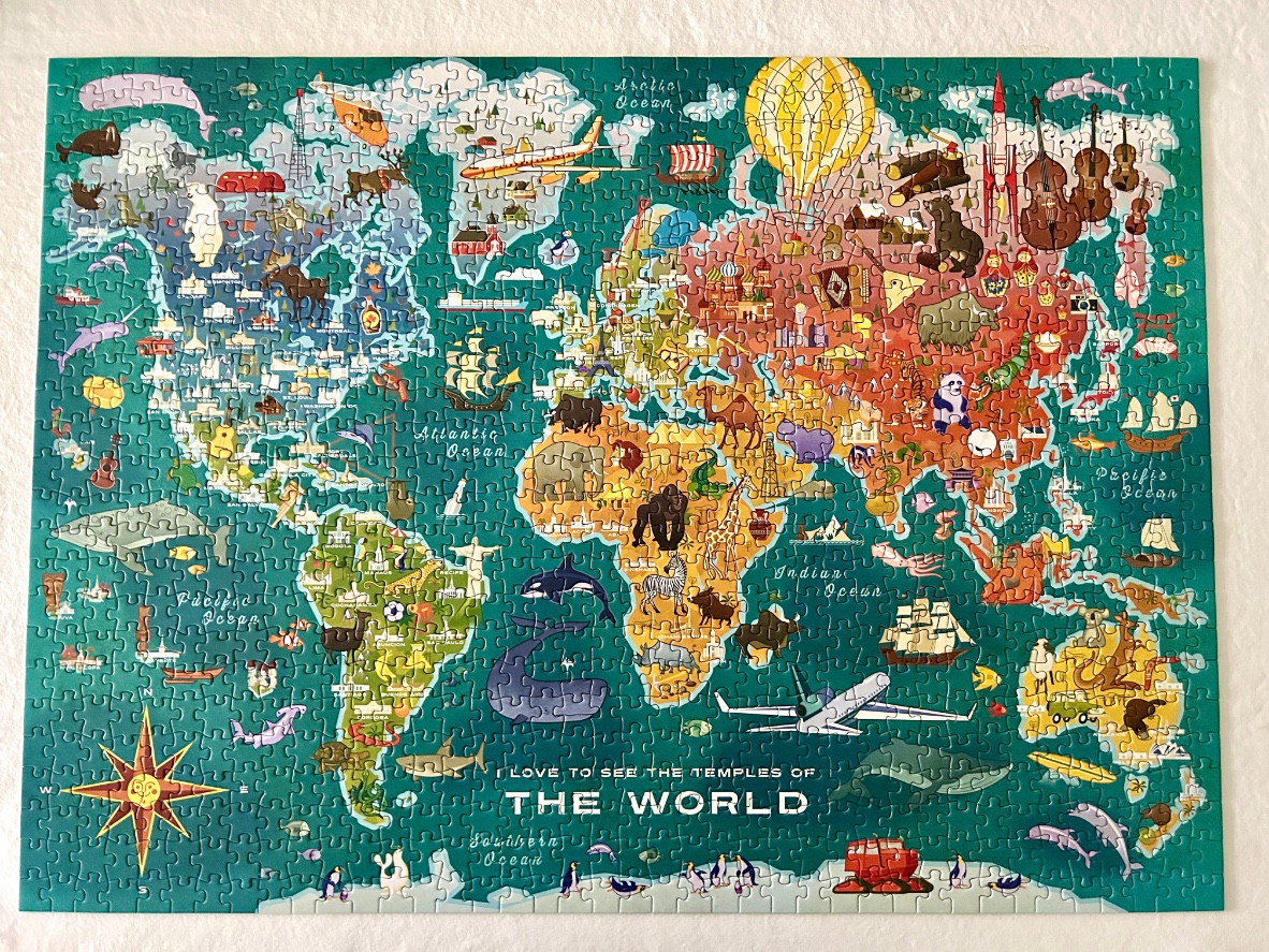 A colorful, illustrated world map featuring regional landmarks, animals, and transport icons.