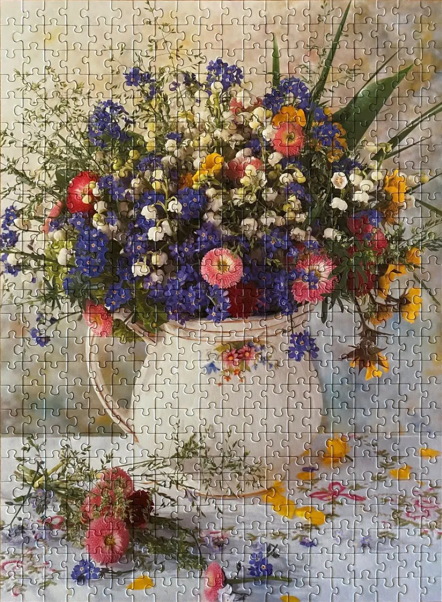 A floral still life painting of a ceramic pitcher filled with blue, pink, and yellow wildflowers.