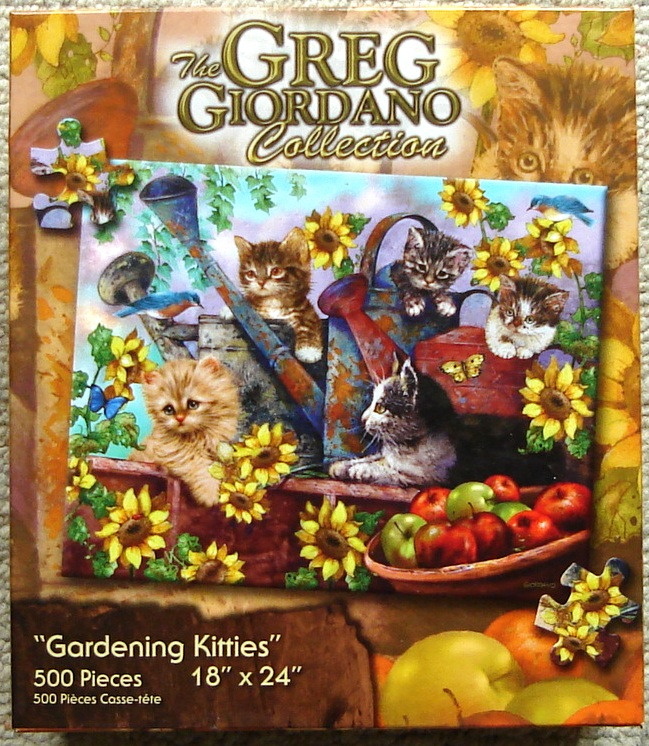 Illustration of four kittens playing among sunflowers, a watering can, and a bowl of apples.