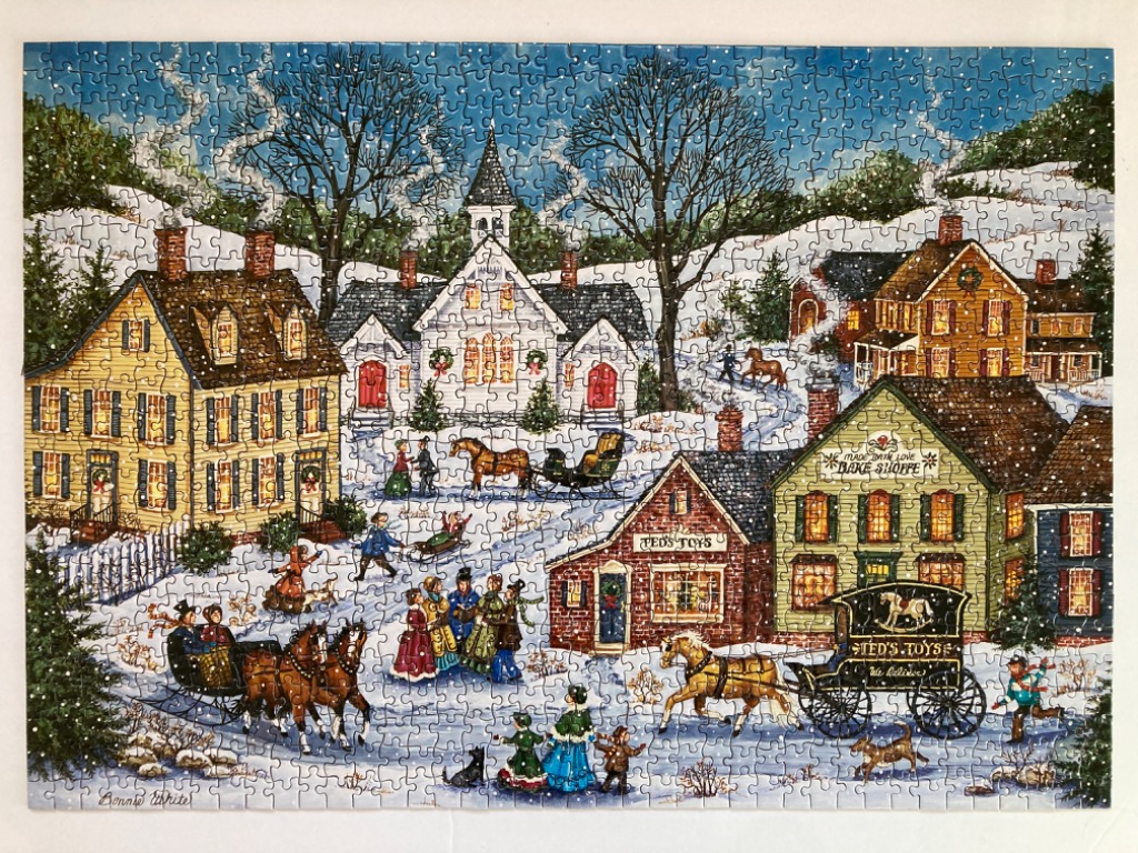 A nostalgic winter village scene with horse-drawn carriages, small shops, and people in period clothing.
