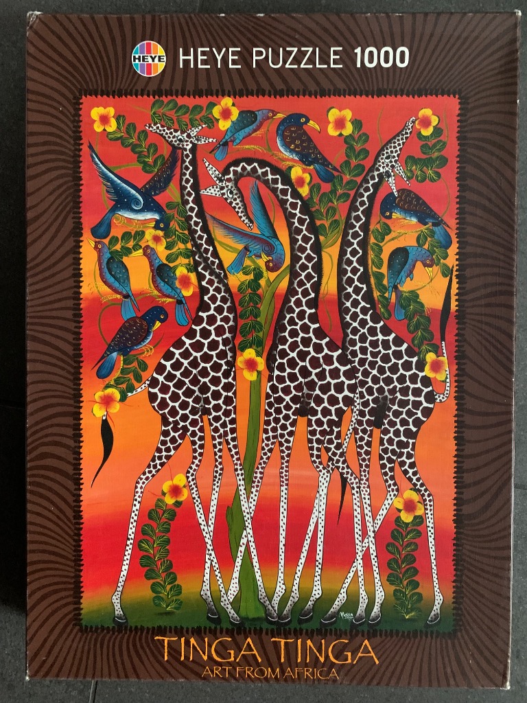Tinga Tinga style folk art painting featuring three giraffes surrounded by birds and yellow flowers against an orange sky.