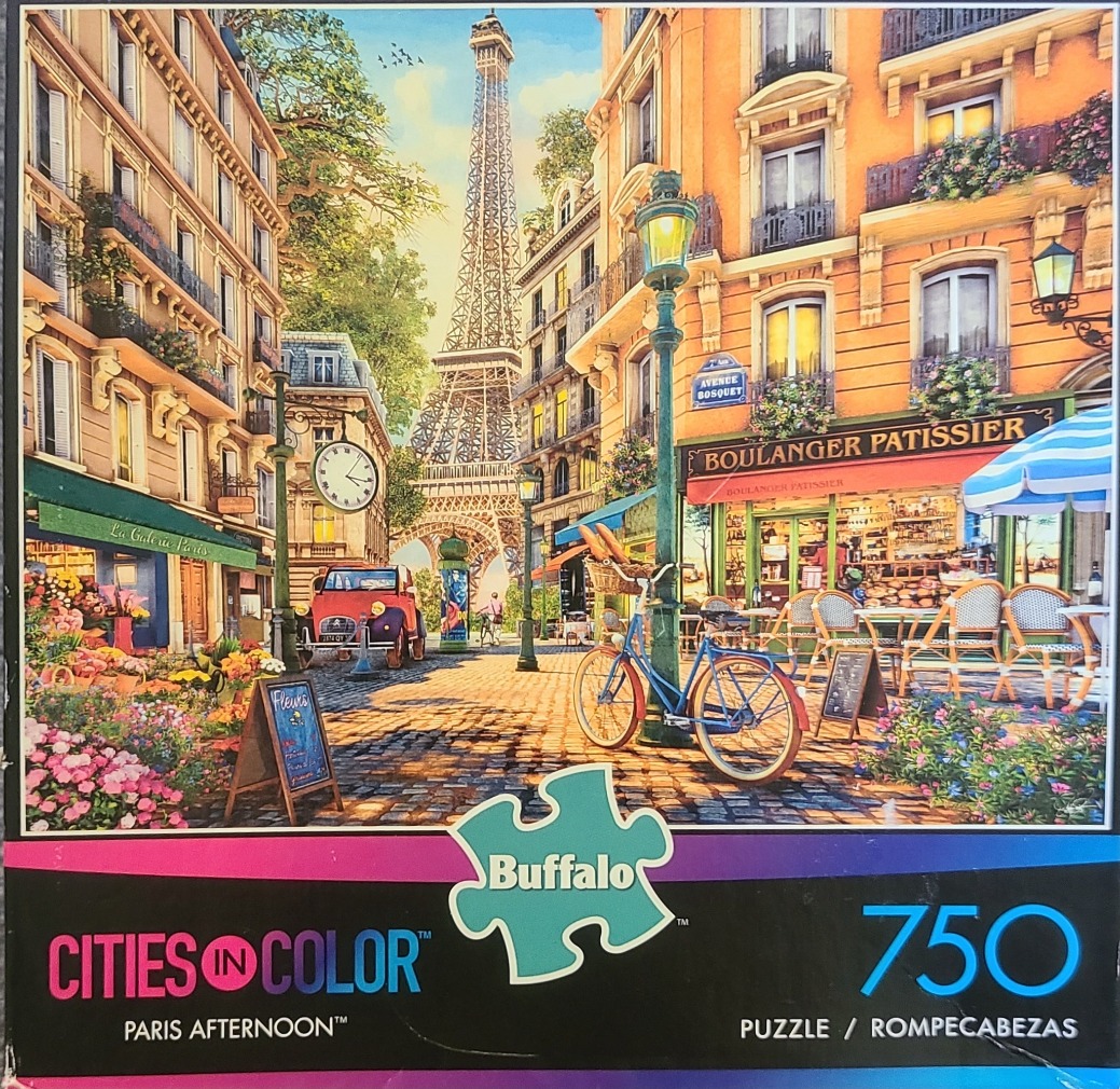 A sunny Parisian street scene with the Eiffel Tower in the distance, featuring a bakery, a bicycle, and flowers.