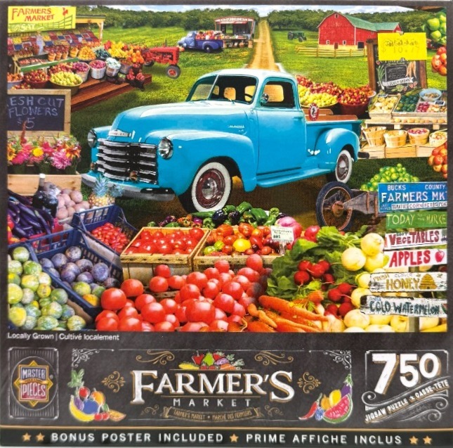 A bright blue vintage pickup truck parked in front of a colorful outdoor farmers market scene.