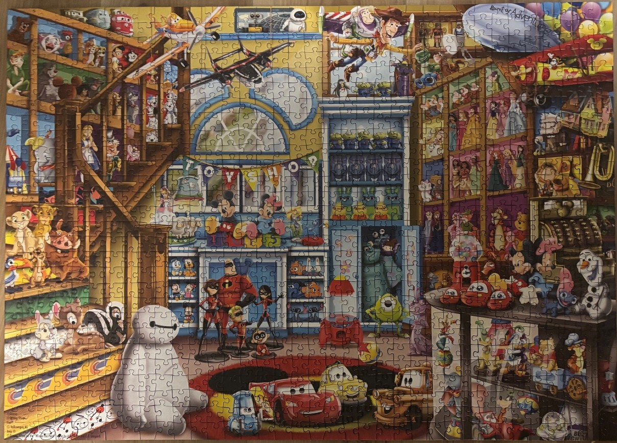 Disney characters in a toy store with vibrant colors.
