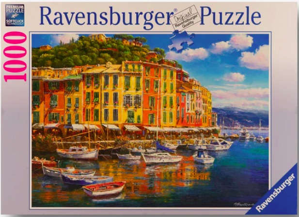 An oil painting of a Mediterranean harbor with brightly colored buildings and boats floating in blue water.
