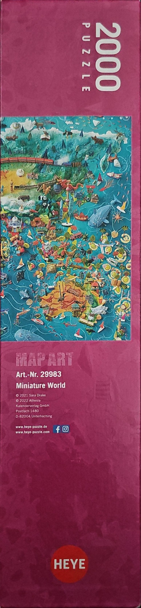Whimsical, colorful world map illustration featuring miniature landmarks and sea creatures on a teal ocean background.