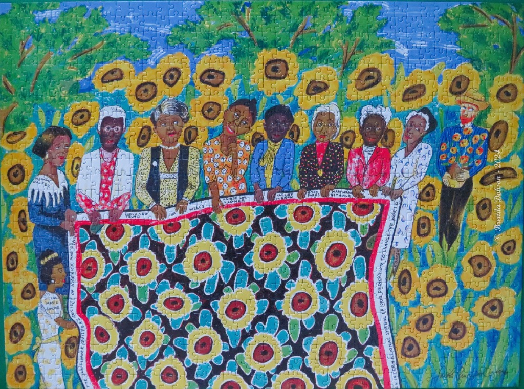 An illustration of historical Black female figures holding a large sunflower-patterned quilt in a sunflower field.