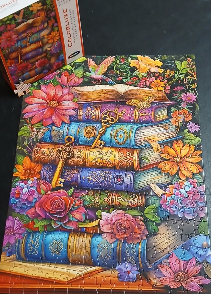 A whimsical illustration of a stack of antique books surrounded by vibrant flowers, a butterfly, and a bird.
