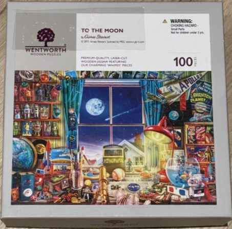 A whimsical illustration of a cluttered room at night with a large window looking out at a full moon.
