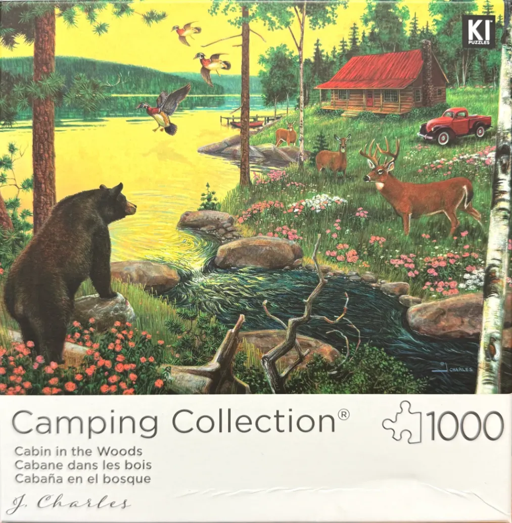 A wilderness scene featuring a bear, deer, birds, and a rustic log cabin near a lake and stream.