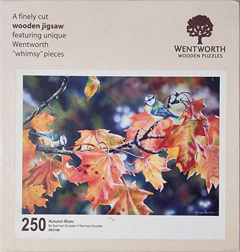A painting of two blue tits perched on autumn maple branches with vibrant orange and red leaves.