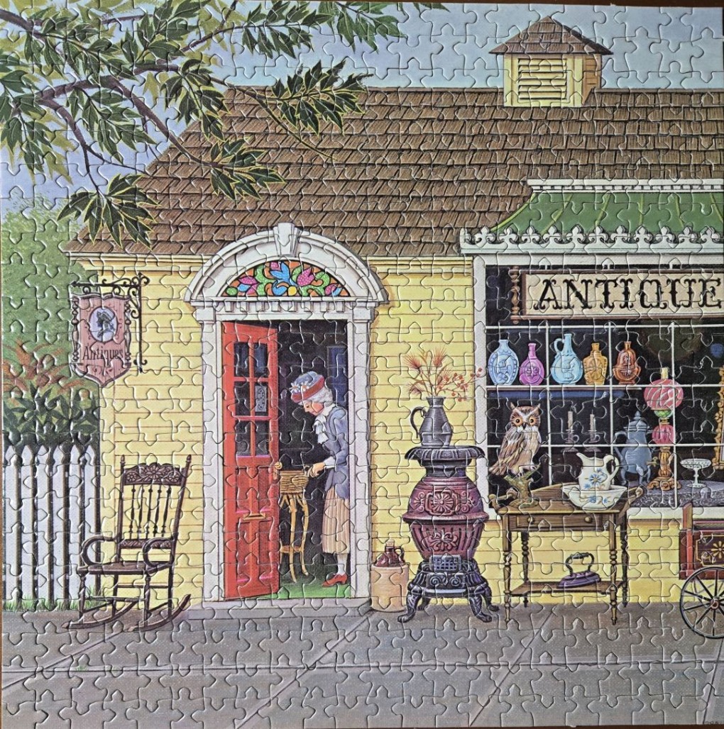 An illustration of an antique shop with a woman in the doorway and various vintage goods on display.