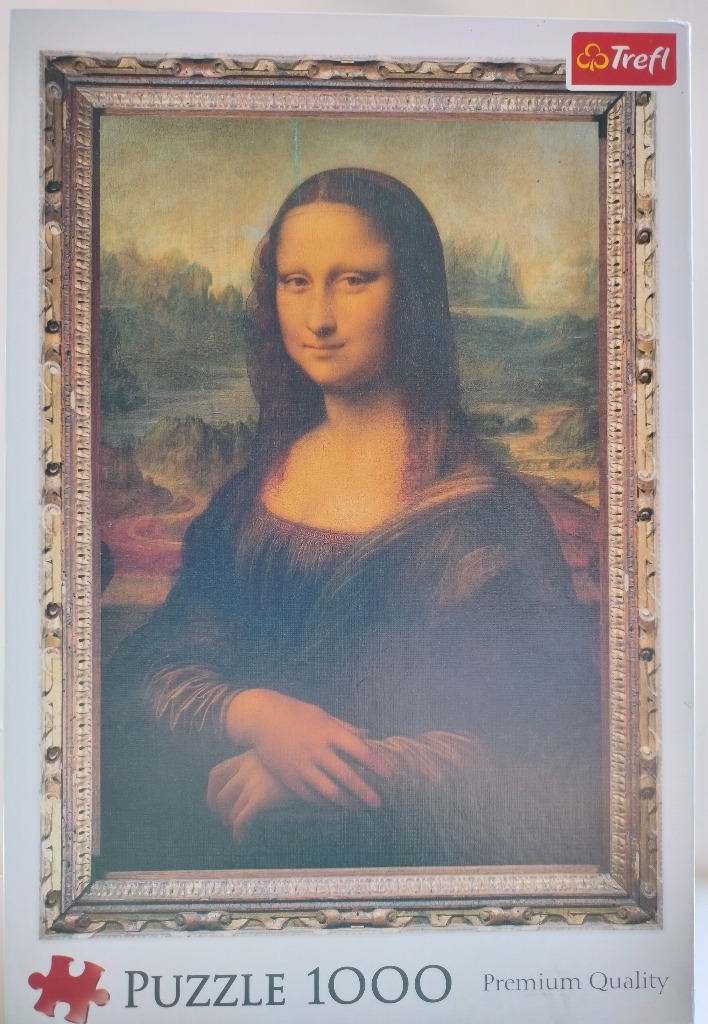 A reproduction of the Mona Lisa by Leonardo da Vinci inside an ornate, weathered wooden frame.