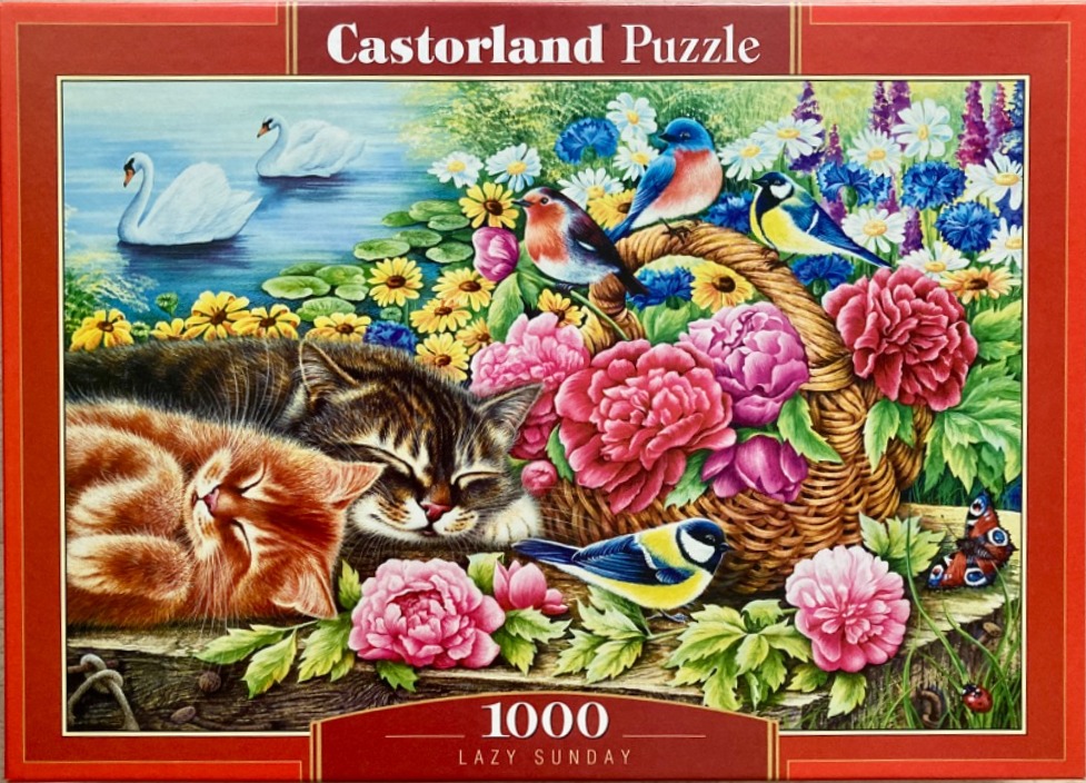 A tabby and ginger cat sleeping next to a flower basket filled with birds in a garden scene.