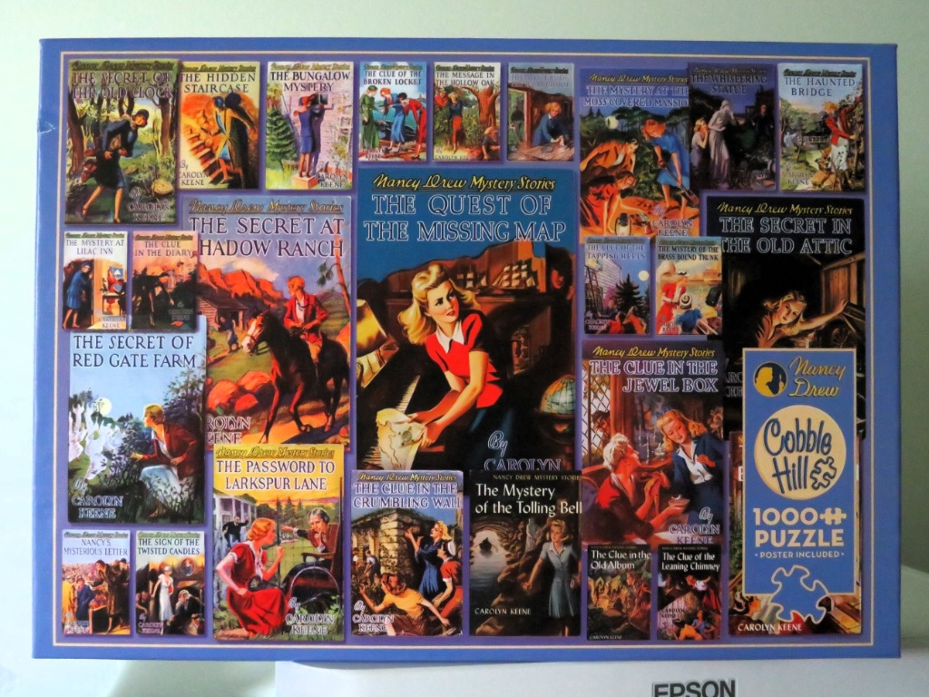 A collage of classic Nancy Drew book covers featuring The Quest of the Missing Map as the central illustration.