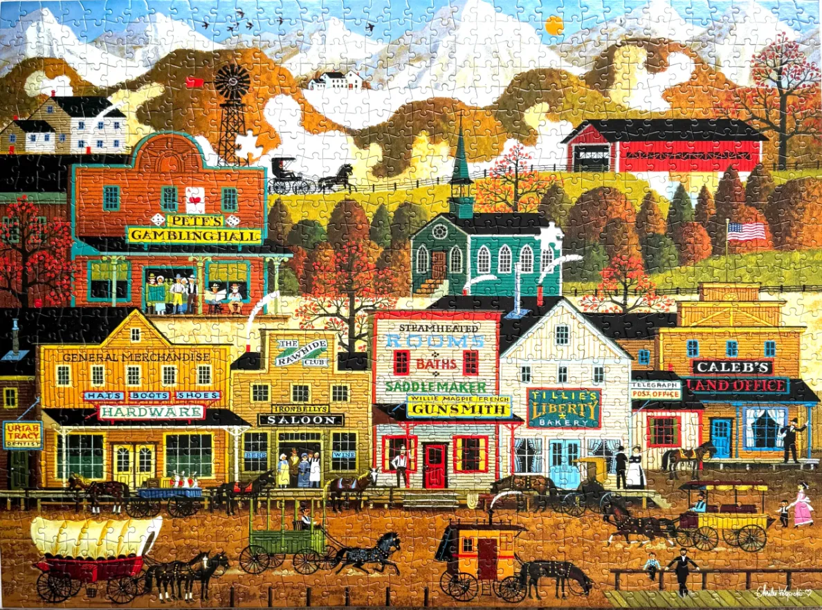 Folk art illustration of a bustling 19th-century frontier town scene with mountains in the background.