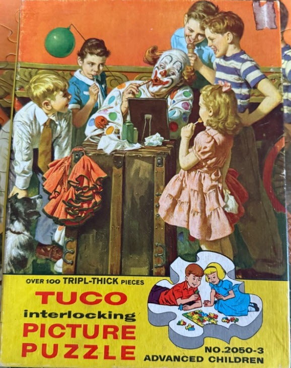 A vintage illustration of a circus clown applying makeup while surrounded by five curious children and a small dog.