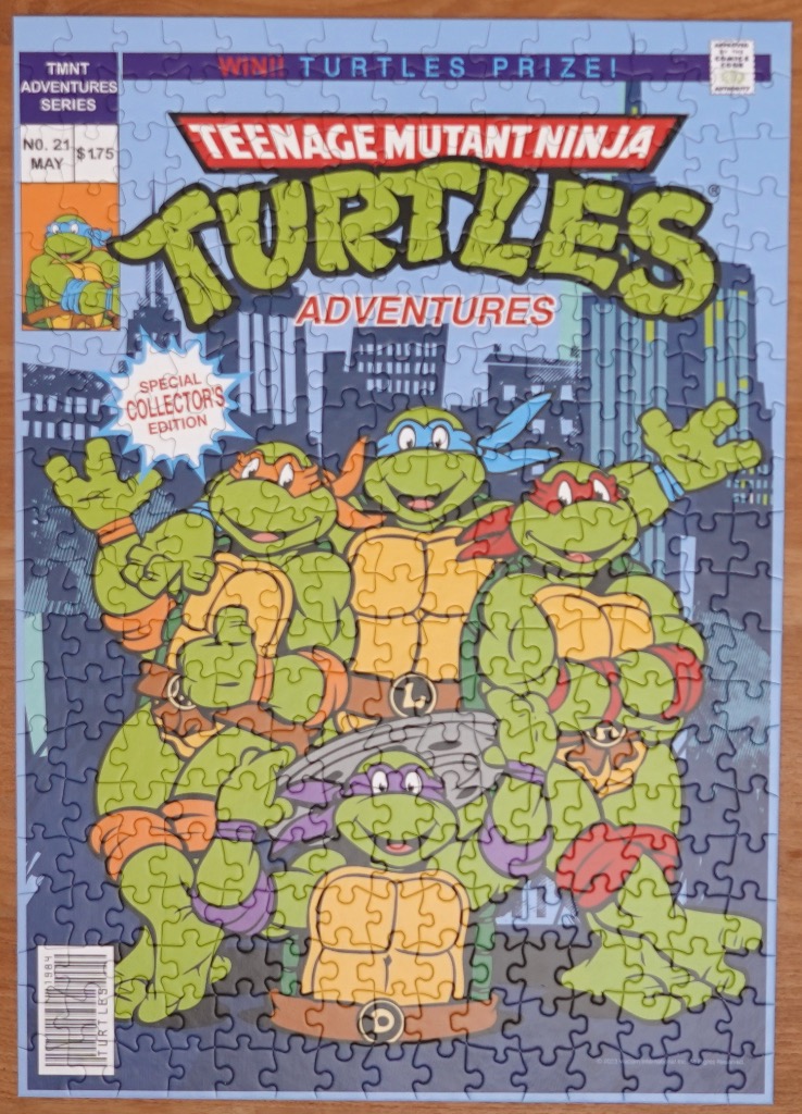 Vintage Teenage Mutant Ninja Turtles comic book cover featuring the four turtles against a city skyline.