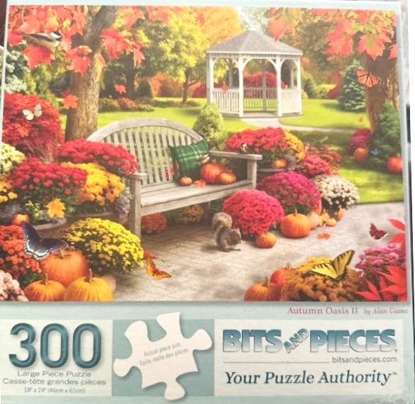 A fall garden scene featuring a wooden bench, a white gazebo, pumpkins, and vibrant autumn flowers.