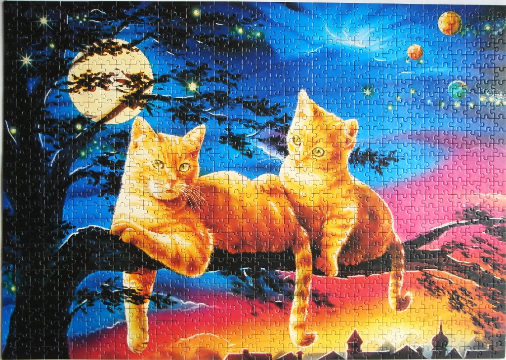 Two orange tabby cats sitting on a tree branch at night against a sky with a full moon and planets.