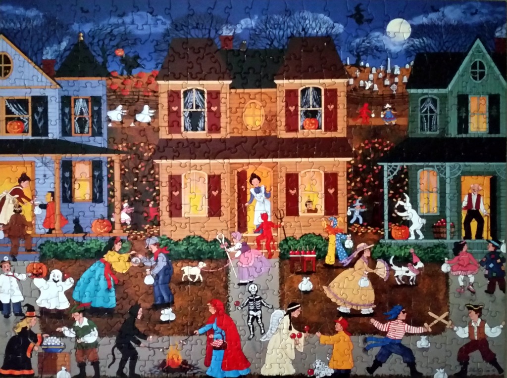 A whimsical illustration of a suburban neighborhood celebrating Halloween at night with children in costumes.