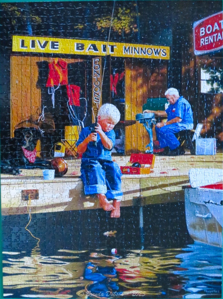 A young boy and an older man fishing from a wooden dock at a bait shop at twilight.