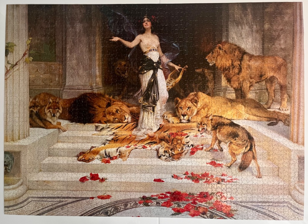 A woman in ancient attire standing amidst lions and wolves on a staircase strewn with red roses.