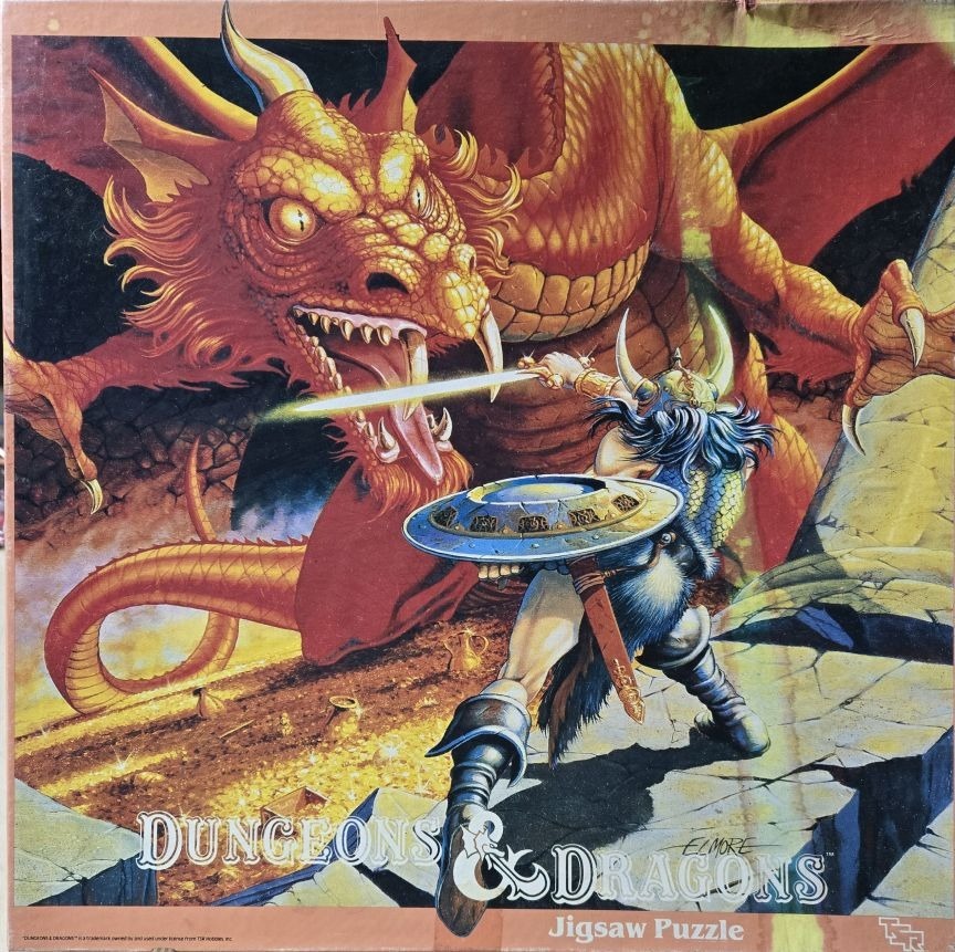 A fantasy illustration of a warrior fighting a large orange dragon in a treasure-filled cave.
