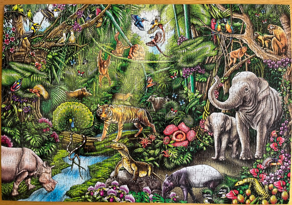 A lush jungle scene filled with diverse tropical animals and vibrant greenery.