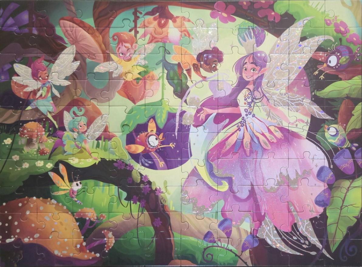 An illustration of a fairy queen in a magical forest surrounded by smaller fairies and woodland creatures.