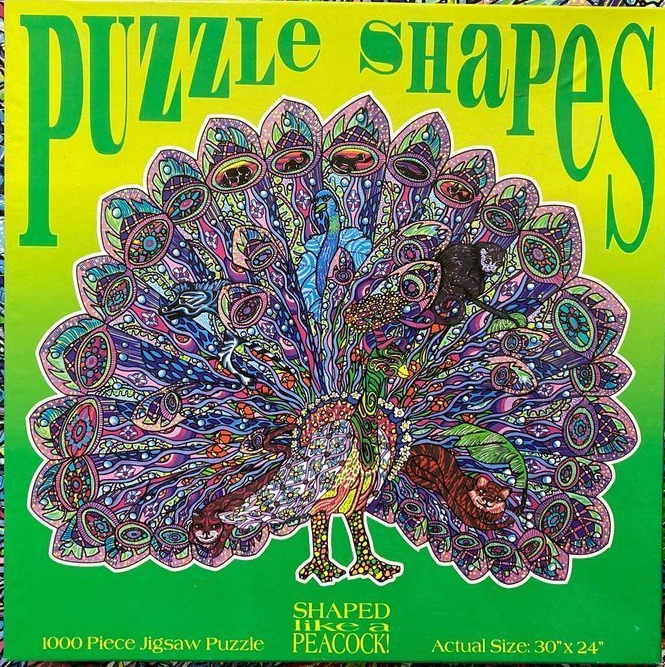 An intricate illustration of a peacock with a vibrant, kaleidoscopic tail featuring hidden animal silhouettes.