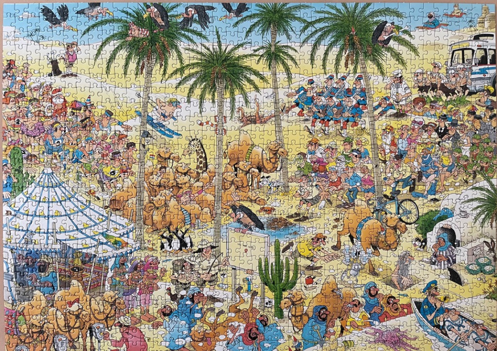 Cartoon illustration of a chaotic, crowded desert scene filled with humorous characters and camels.