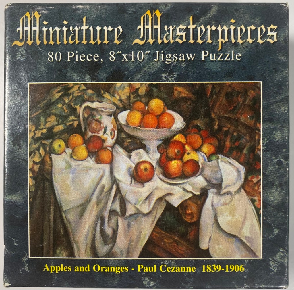 Still life oil painting by Paul Cézanne featuring a table set with oranges, apples, and a decorative pitcher.