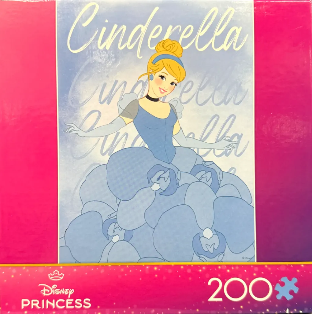 Cinderella in her iconic blue ballgown against a soft blue background.