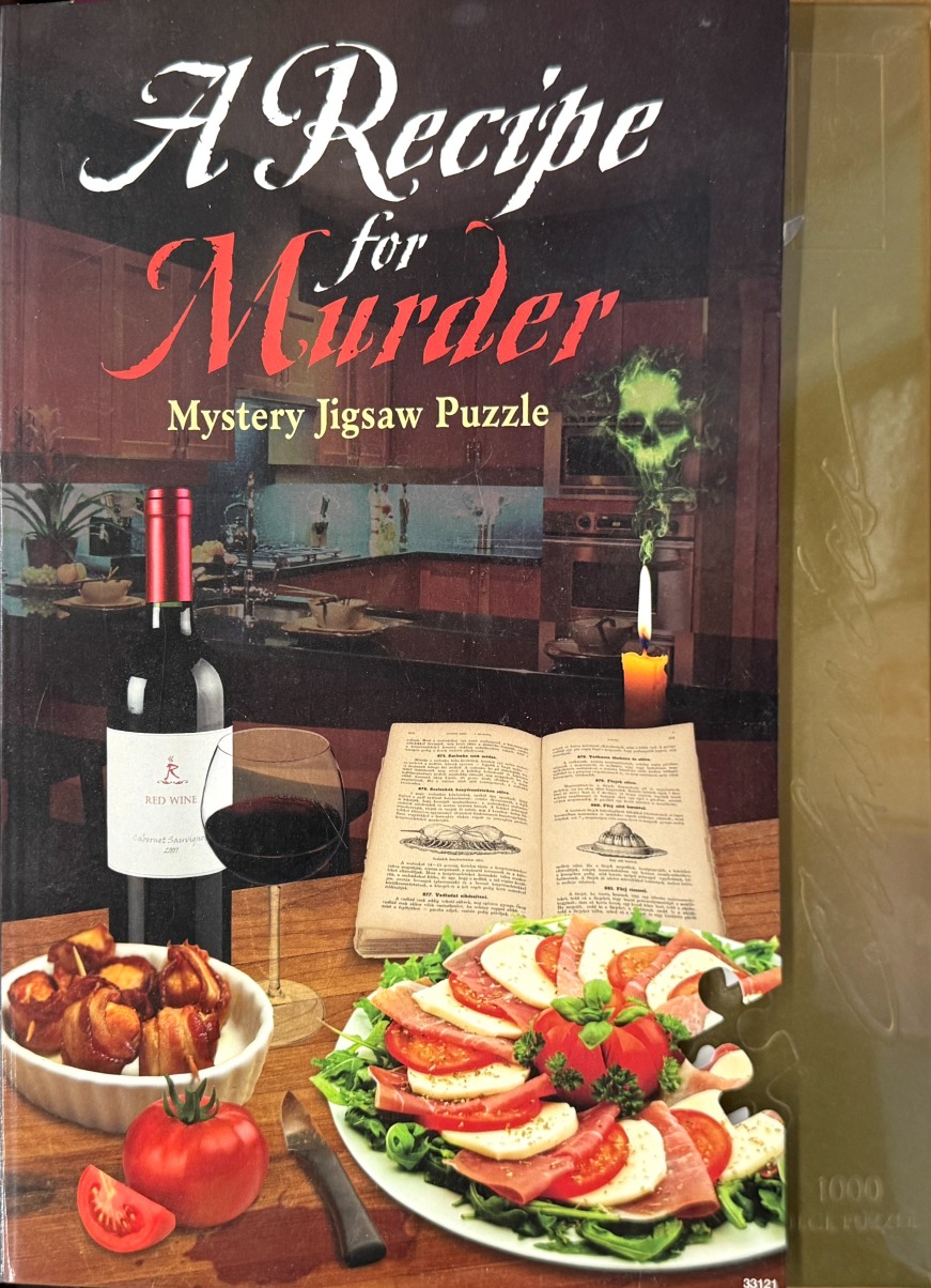 A spooky kitchen scene with red wine, appetizers, and an open cookbook featuring a ghostly skull in the candle smoke.