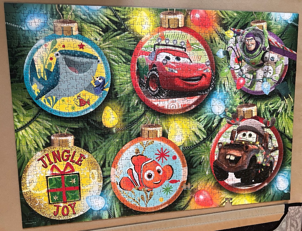 Disney and Pixar themed Christmas tree ornaments featuring popular movie characters.