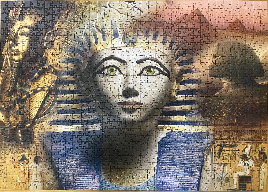 Montage of Ancient Egyptian imagery featuring the pharaoh Tutankhamun and desert landscapes.