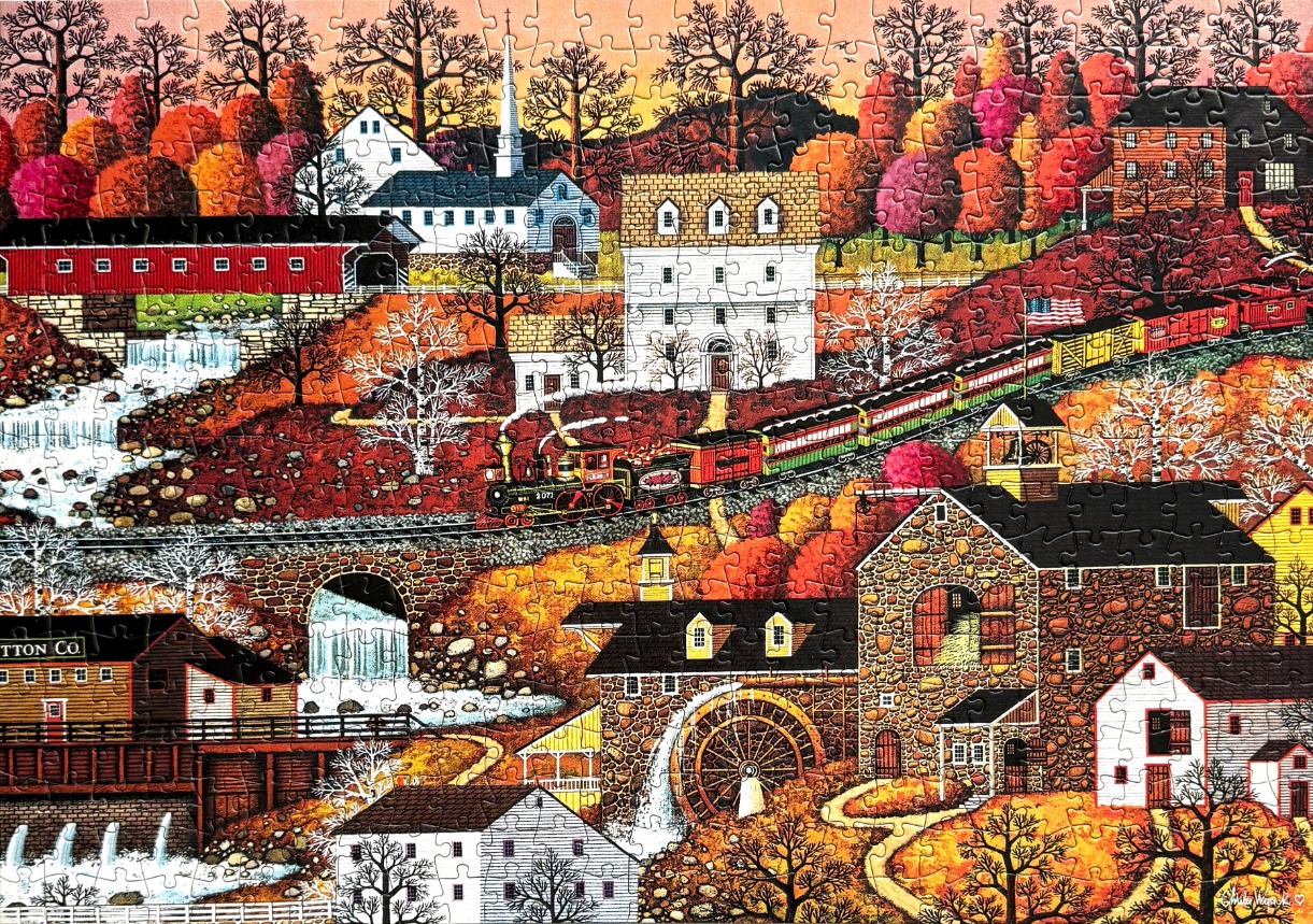 A nostalgic autumn village scene featuring a steam train, water mill, and covered bridge.