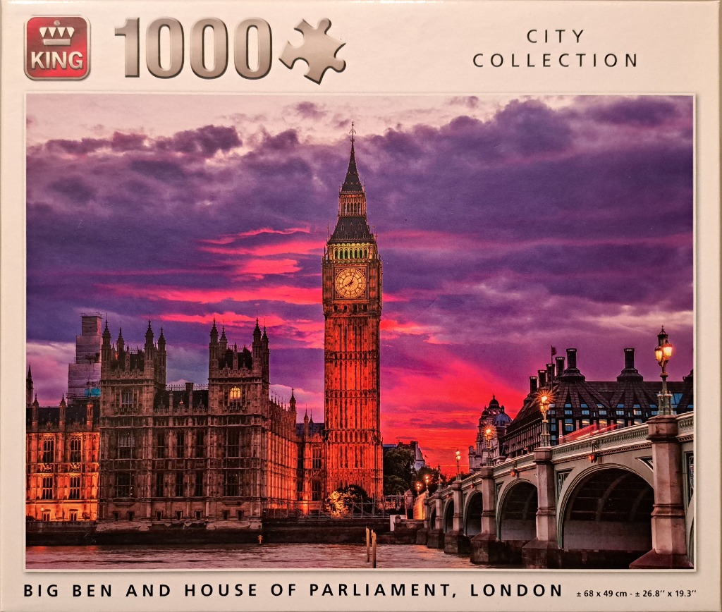 Big Ben and the Houses of Parliament in London at sunset with a dramatic purple and red sky.