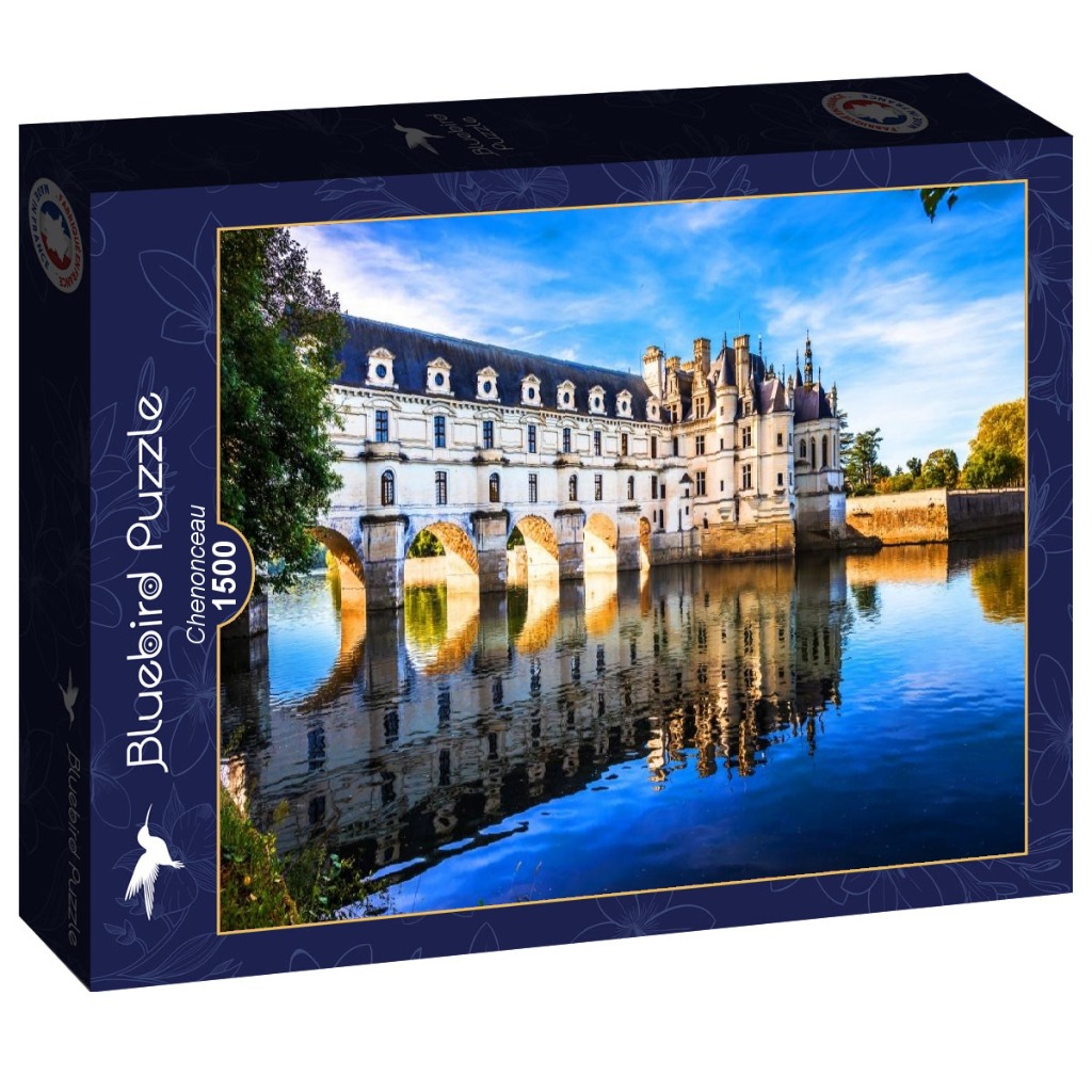 The French Chateau de Chenonceau reflected in the River Cher on a sunny day.