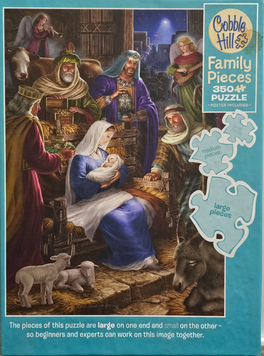 A traditional nativity scene featuring Mary, Joseph, the baby Jesus, and the three wise men in a stable setting.