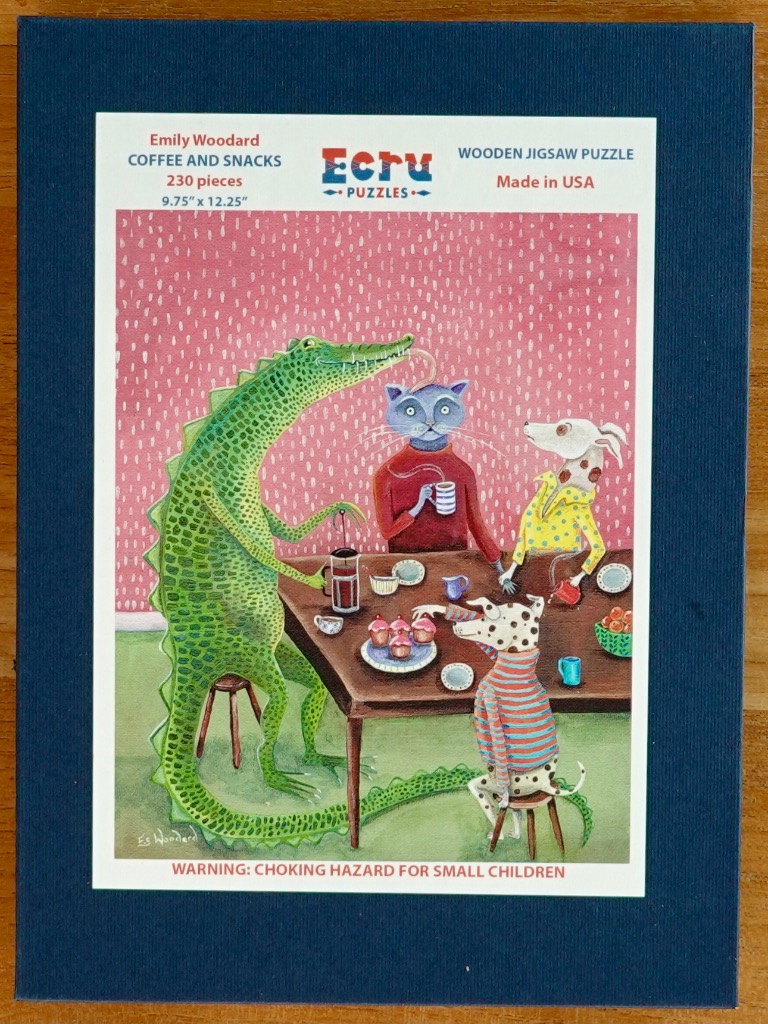 Whimsical illustration of an alligator, a cat, and two dogs gathered around a table for coffee and snacks.