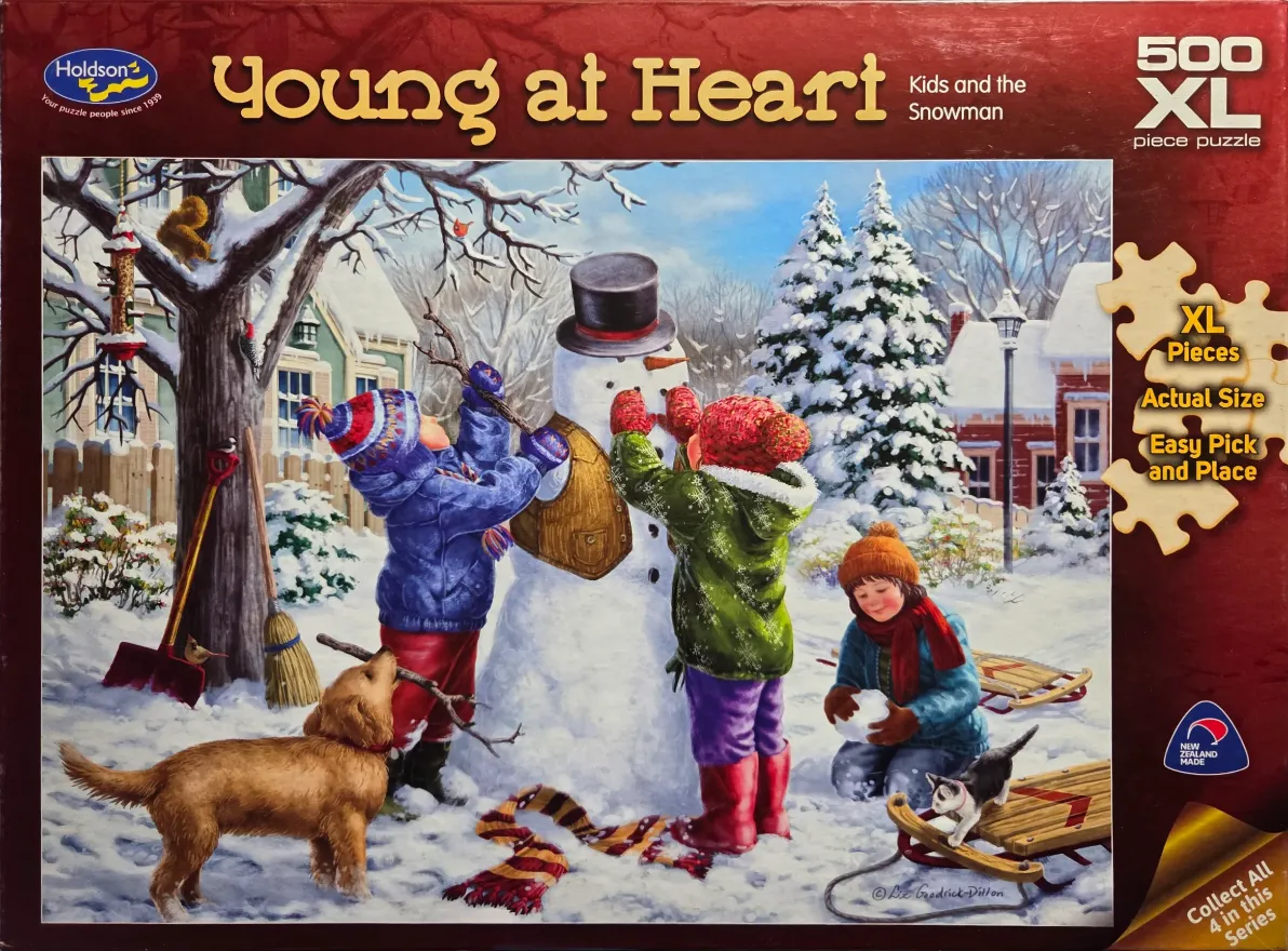 A nostalgic winter scene of three children and a dog building a snowman in a snow-covered front yard.