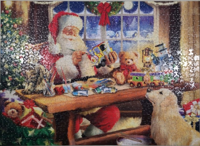 Santa Claus painting a toy train in his workshop with a dog nearby.