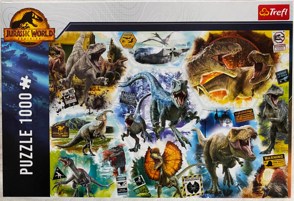 A montage of various predatory and herbivorous dinosaurs from the Jurassic World franchise.