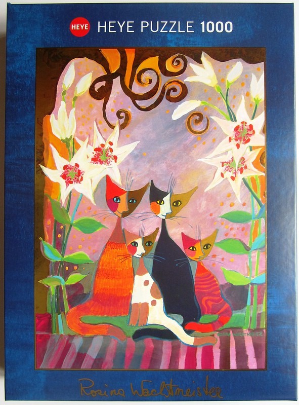 Whimsical painting of four stylized cats standing amidst tall white lily flowers against a pink and gold background.