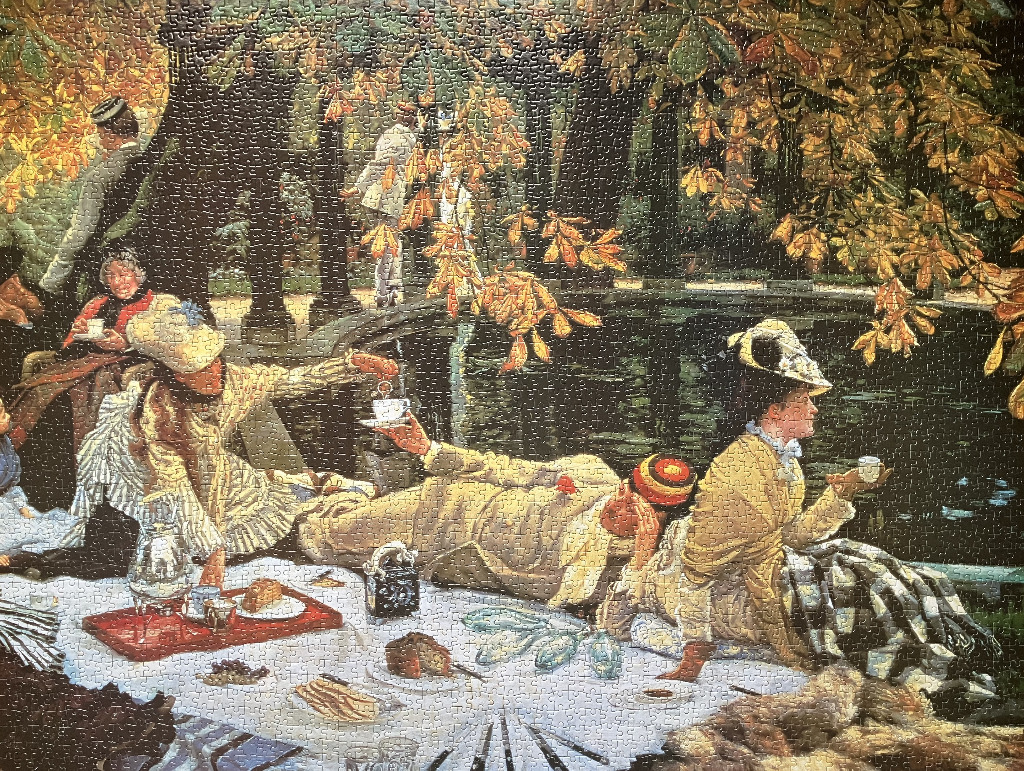 Victorian-style picnic scene near a pond with figures in period clothing under autumn trees.