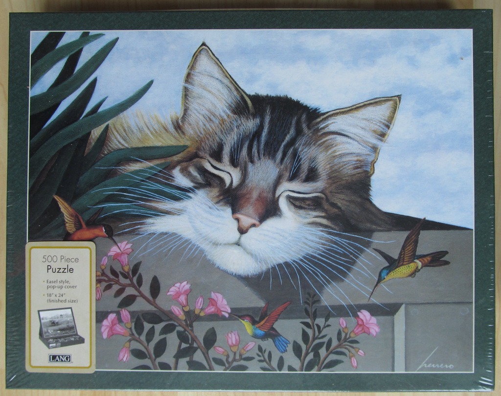 An oil painting of a tabby cat resting on a ledge with three hummingbirds flitting around pink flowers.